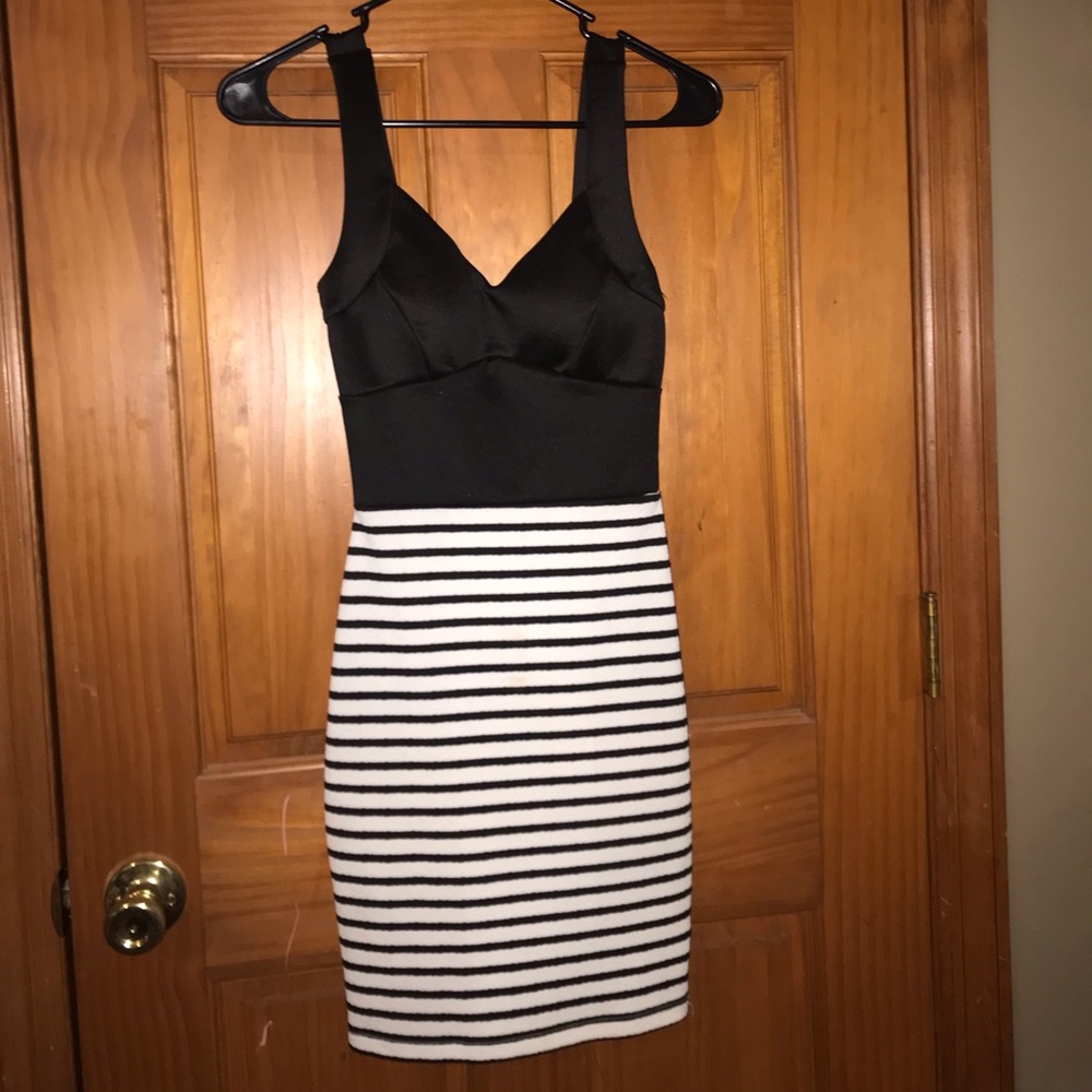 Black and white striped body con dress.